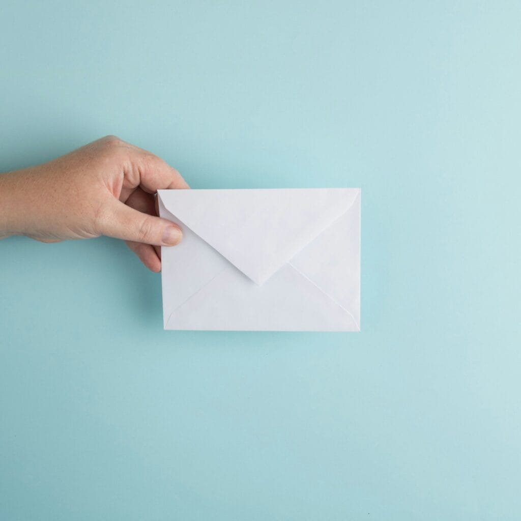 Invitation Envelope in the Hand
